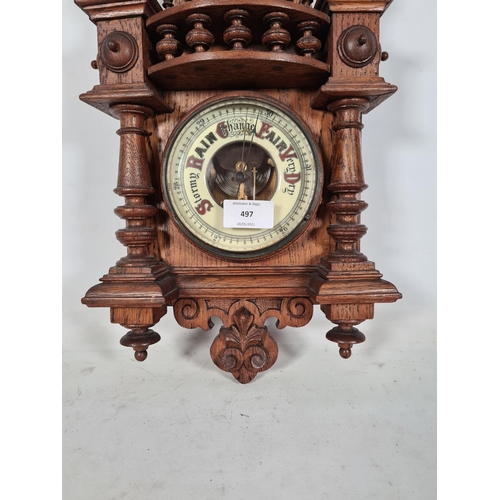 497 - A Victorian oak aneroid barometer - approx. 61cm high x 24cm wide