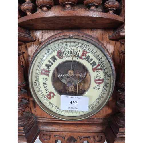 497 - A Victorian oak aneroid barometer - approx. 61cm high x 24cm wide