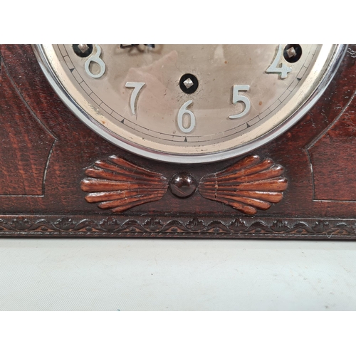 500 - An 1930s oak Napoleon hat Westminster chime mantle clock with pendulum