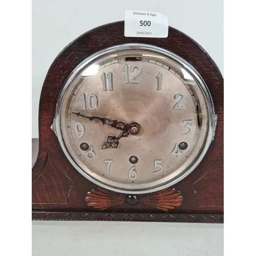 500 - An 1930s oak Napoleon hat Westminster chime mantle clock with pendulum