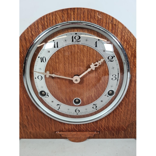 503 - A 1930s oak cased Westminster chime mantle clock with key & pendulum