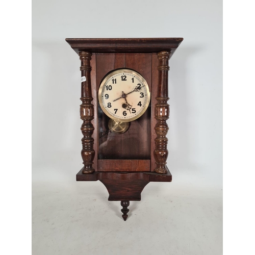 504 - Two vintage clocks, one Art Deco oak cased chiming mantle clock and one Victorian stained pine wall ... 