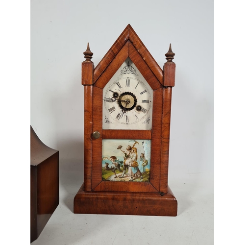 505 - Two vintage clocks, one American walnut cased mantle clock with key & pendulum and one 1940s walnut ... 