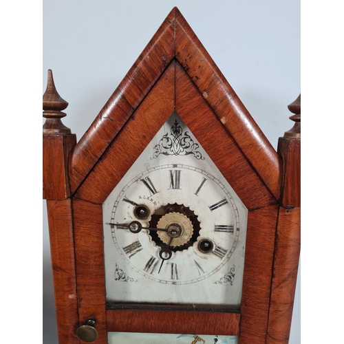 505 - Two vintage clocks, one American walnut cased mantle clock with key & pendulum and one 1940s walnut ... 