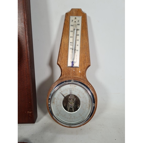 506 - Three items, one Hamilton-Marriott clock barometer, one oak Shortland smith's barometer and one Craf... 