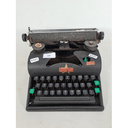 509 - A vintage black metal Lilliput child's typewriter