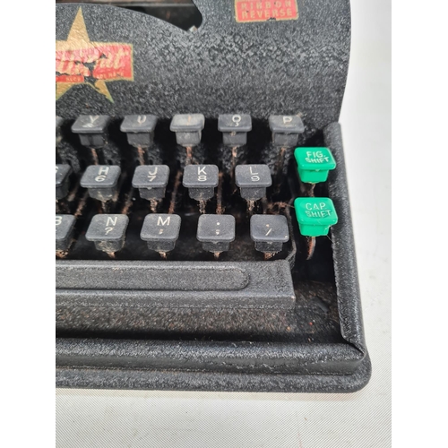 509 - A vintage black metal Lilliput child's typewriter