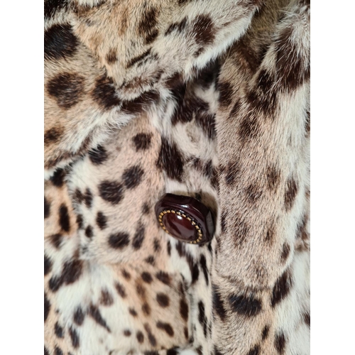 515 - A late 1940s/ early 1950s ladies leopard skin jacket with silk lining