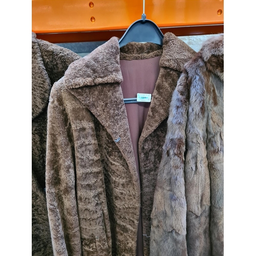 516 - Four ladies fur and faux fur coats