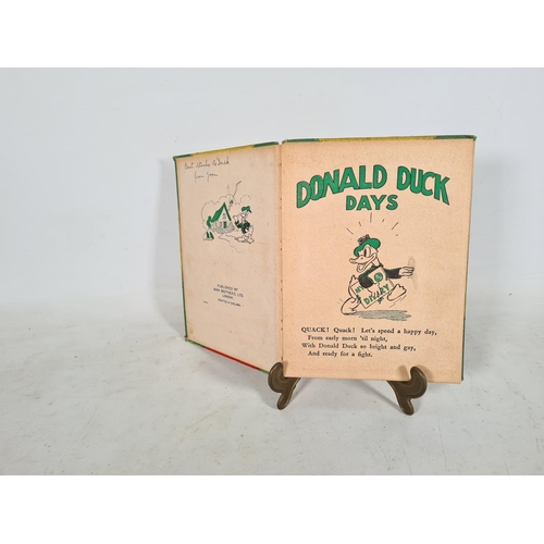 530 - Four vintage hardback books, one 'Treasury of Poetry' by Hilda Boswell, one 'Donald Duck Days' by Wa... 