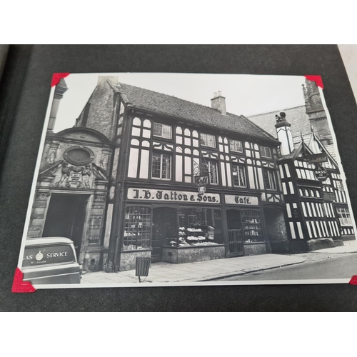 532 - A photo album containing a large collection of black & white photographs and postcards of old town L... 