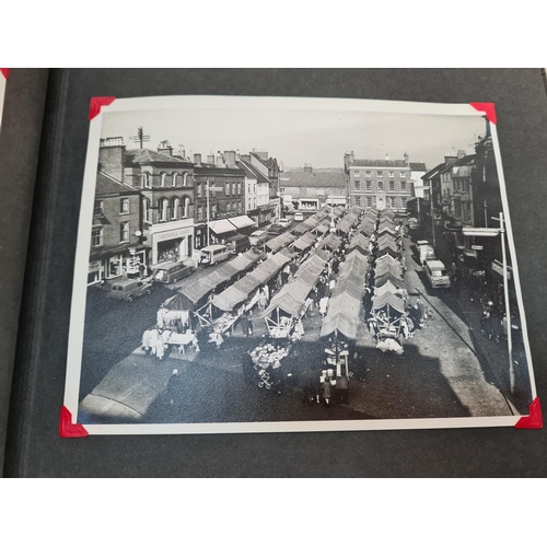 532 - A photo album containing a large collection of black & white photographs and postcards of old town L... 