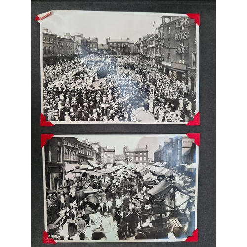 532 - A photo album containing a large collection of black & white photographs and postcards of old town L... 