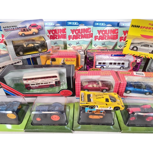 539 - A collection of boxed die cast vehicles to include ERTL Young Farmer accessories, Corgi Classics Mac... 