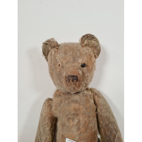 544 - A mid 20th century articulated straw filled bear