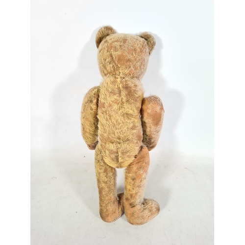 544 - A mid 20th century articulated straw filled bear