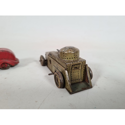 547a - Two tin plate clockwork toy vehicles, one DRGM Foreigh Z.4,8 tank and one red foreign armoured vehic... 