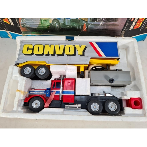 552 - A vintage boxed Corgi radio controlled Truckertronic Convoy articulated truck model no. M5600