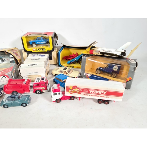 561 - A large quantity of boxed and loose die cast vehicles to include Corgi Classics Ford Model T van, Co... 