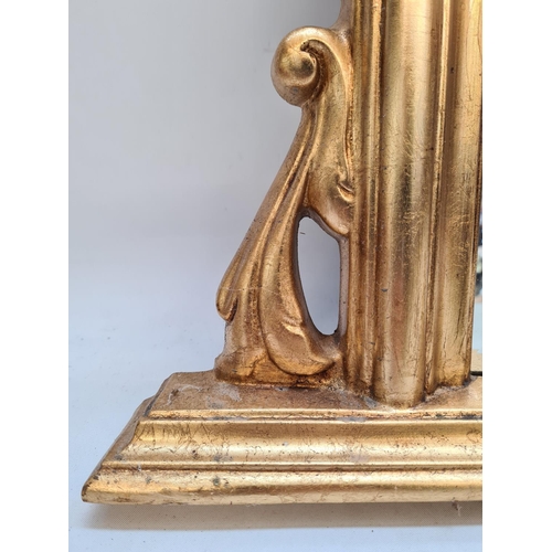 567 - A Victorian style gilt framed bevelled edge over mantle mirror - approx. 80cm high x 124cm wide