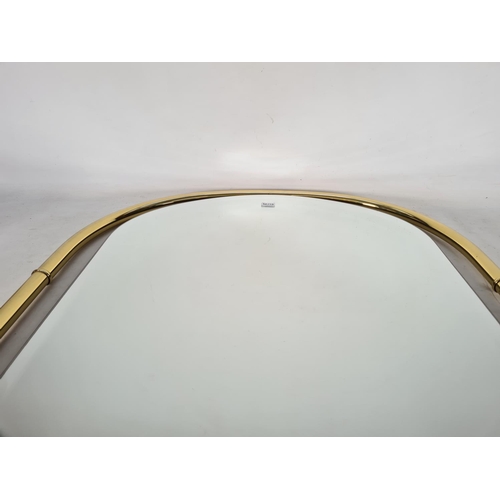 578 - A brass framed bevelled edge wall mirror - approx. 91cm x 62cm