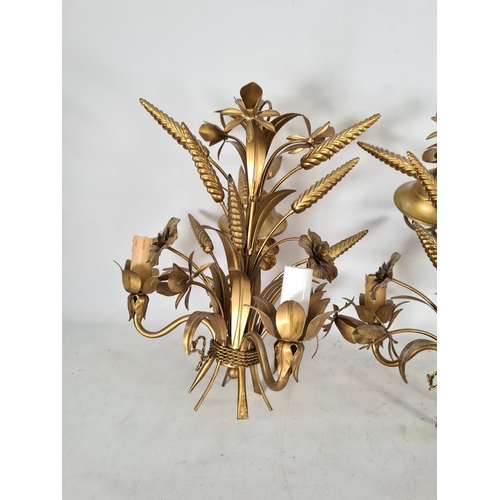 602 - A set of three contemporary Italian gilt metal three branch ceiling lights