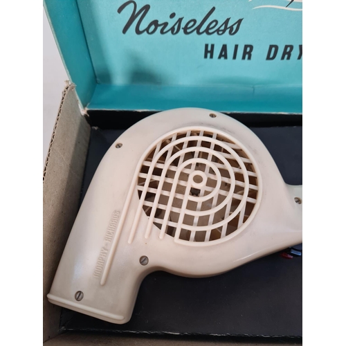 604 - A vintage boxed Morphy-Richards noiseless hairdryer