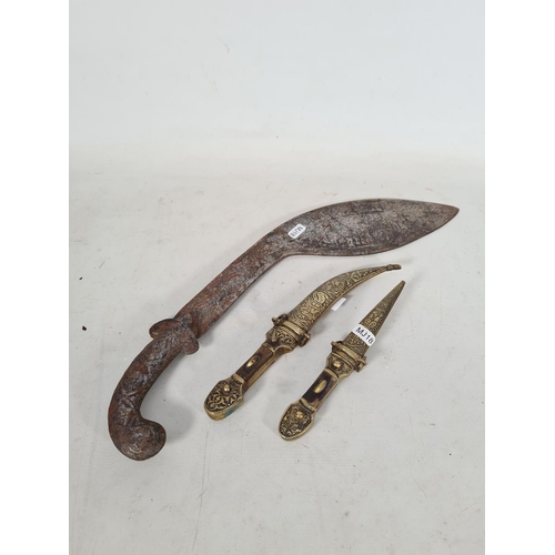 605 - Three knives to include one Syrian brass & antler Jambiya/dagger with brass sheath and curved steel ... 