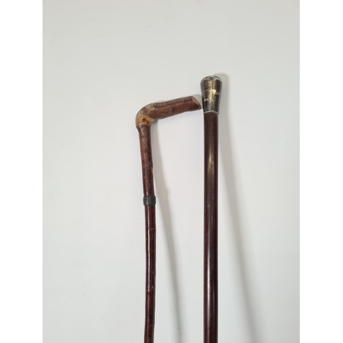 611 - Two antique walking canes/sticks to include one late 19th century example with hallmarked Edinburgh ... 