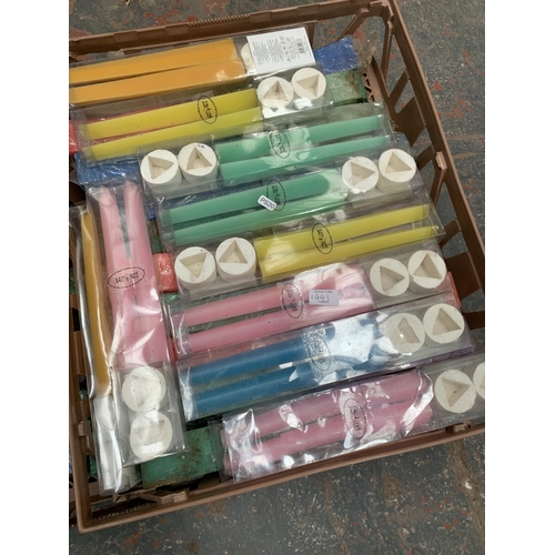 1441 - Three boxes containing various colours and style of candles