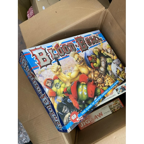 1458 - Three boxes containing various items to include Blood Bowl board game, Cluedo, Battleship, various f... 