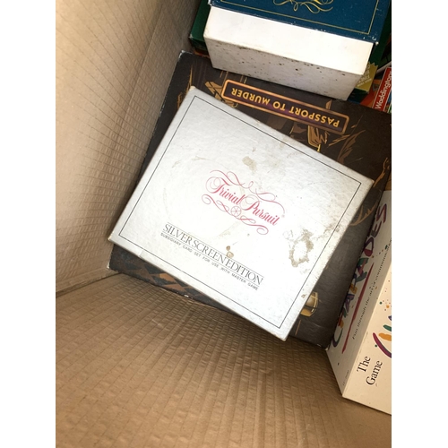 1477 - Two boxes of various board games to include Cluedo, Murder Mystery, Trivial Pursuit, Charades etc.