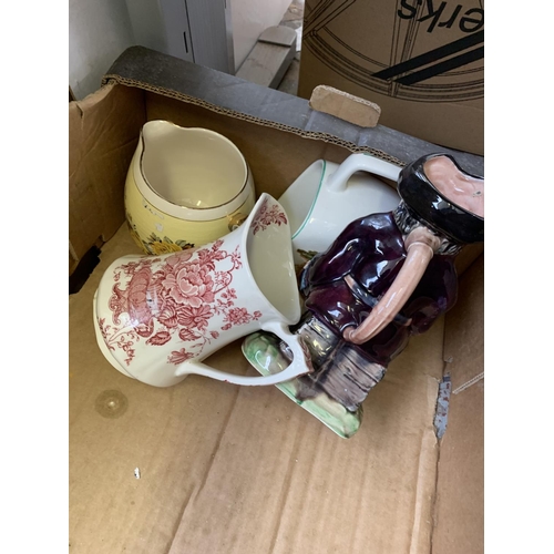 1503 - A box containing various items to include vintage Belling bed warmer, collectible jugs, Ronson heate... 