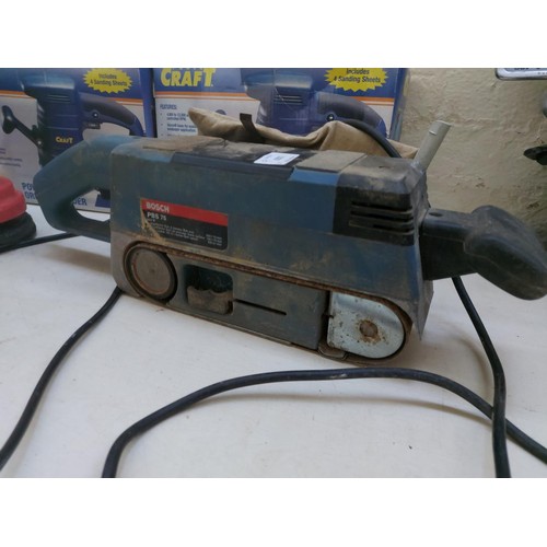 1323 - Six electric power tools, one blue Bosch PBS75 belt sander, one boxed Powercraft 420w orbital sander... 