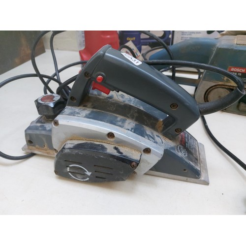 1323 - Six electric power tools, one blue Bosch PBS75 belt sander, one boxed Powercraft 420w orbital sander... 