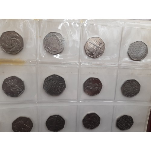 361 - A folder containing a large collection of vintage coins to include 43 two pound coins, one 50% silve... 