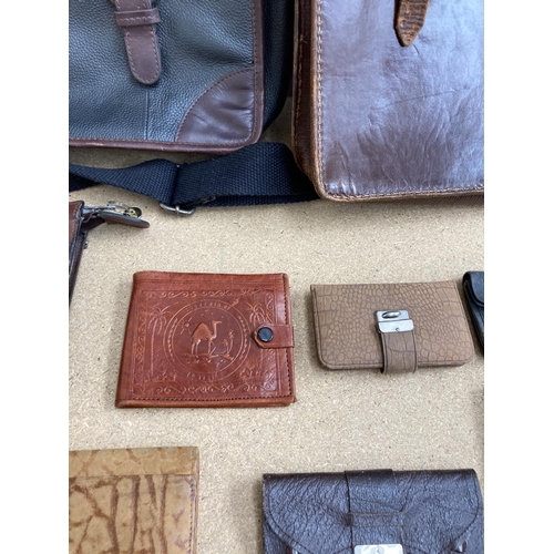 523 - Thirty various antique and vintage gents bags, wallets and cases to include leather, souvenir etc.