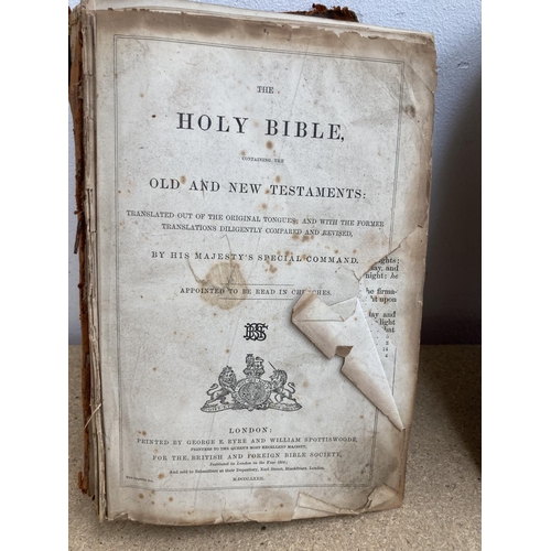 529 - Two antique books, one 'The Improved London Editon of Barclays Dictionary' and one Holy Bible contai... 