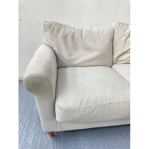 795 - A Next grey upholstered two seater sofa