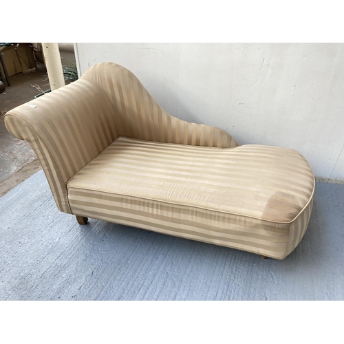 796 - A modern gold and beige striped upholstered chaise lounge