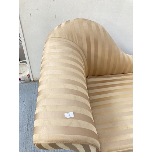 796 - A modern gold and beige striped upholstered chaise lounge