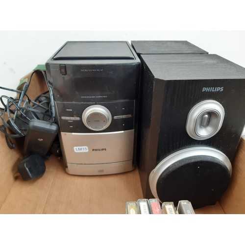 1104 - Two boxes and a plastic tray containing Philips MC147 micro system, BT landline phone and CDs and ca... 