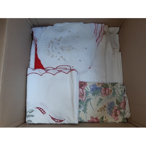 1493 - Two boxes of various items containing various fabrics, ornaments, Royal Doulton Queen Victoria chara... 