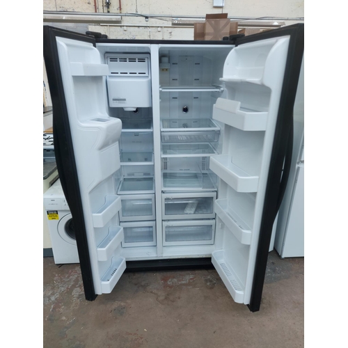 Larder fridge deals with ice dispenser