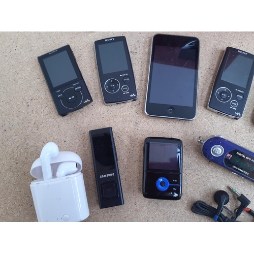 1013 - A box containing personal media devices to include three Sony Walkman digital media players (NWZ-A81... 