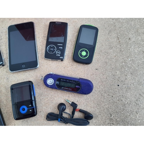 1013 - A box containing personal media devices to include three Sony Walkman digital media players (NWZ-A81... 