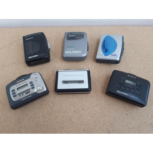 1019 - Six personal stereos to include four Sony Walkman cassette/two band radios (WM-FX10, WM-FX193, WM-FX... 