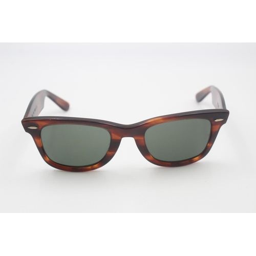 A pair of vintage Bausch \u0026 Lomb Ray-Ban Wayfarer sunglasses