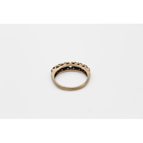 41 - A 9ct gold sapphire and gemstone half eternity ring, size J ½ - approx. gross weight 1.7 grams