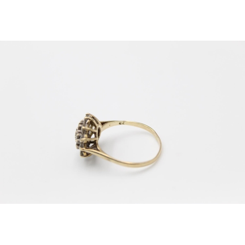 45 - A 9ct gold gemstone cluster ring, size Q ½ - approx. gross weight 2.5 grams